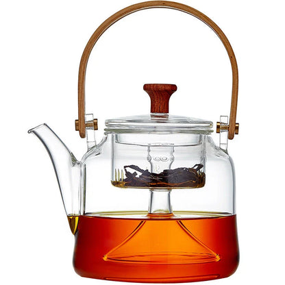 Japanese style glass bamboo handle teapot kettle on a wooden table