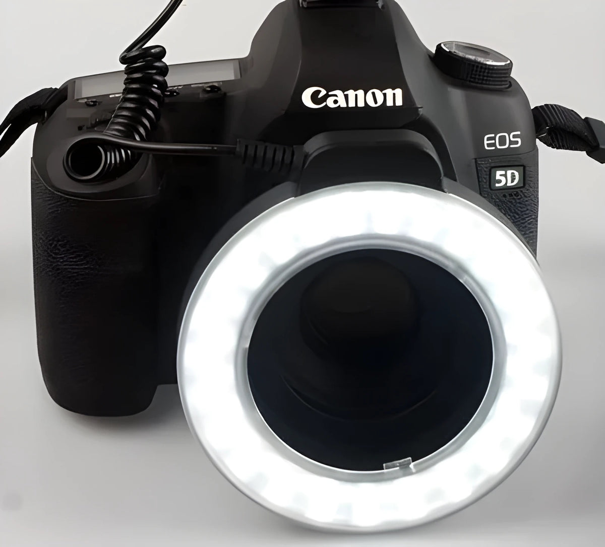 W48 LED ring light with 48 beads, six adapter rings, white and amber shades, on a table