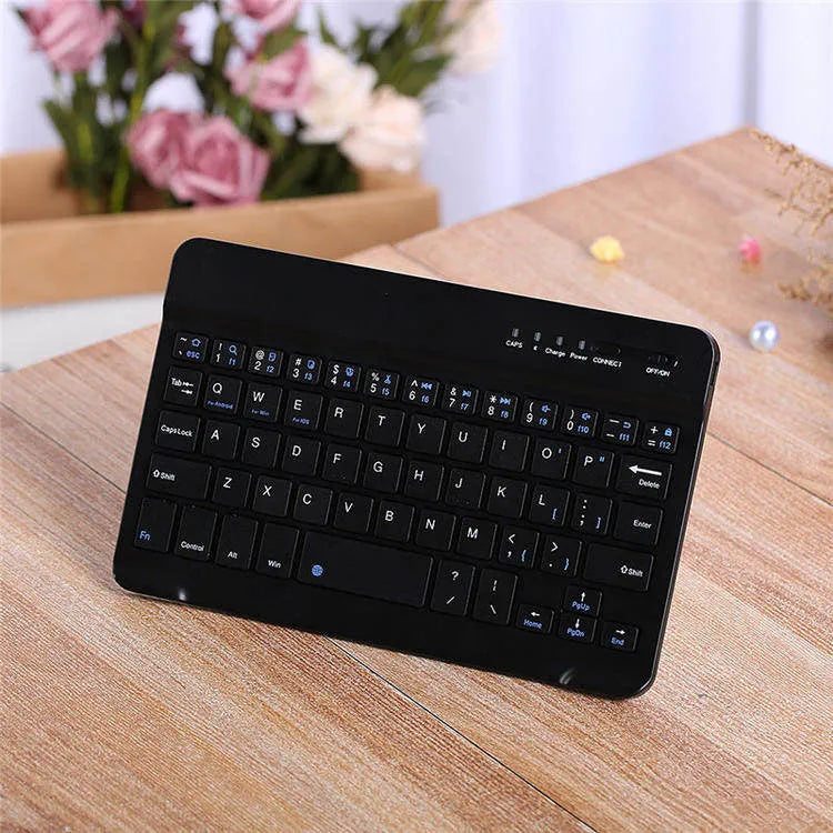 Wireless Bluetooth mini ultra-thin keyboard for laptop, available in black and white, with plug-and-play support