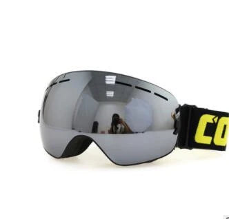 Premium ski goggles with wide spherical lens, anti-fog coating, and adjustable strap for winter sports activities