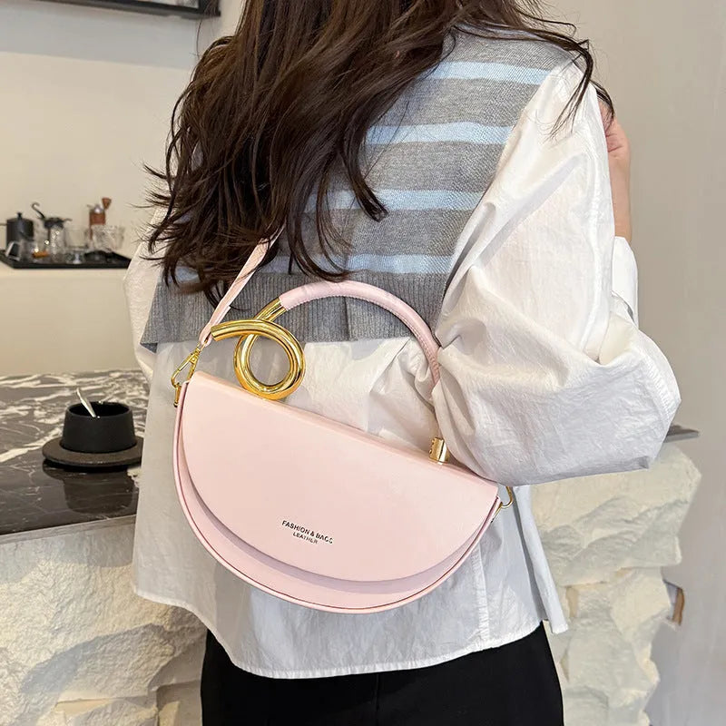 Solid colour PU oval saddle bag with zipper interior in khaki