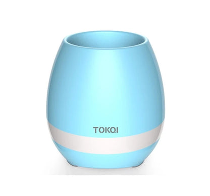 Touch-sensitive music vase desktop audio in pink, blue, and white