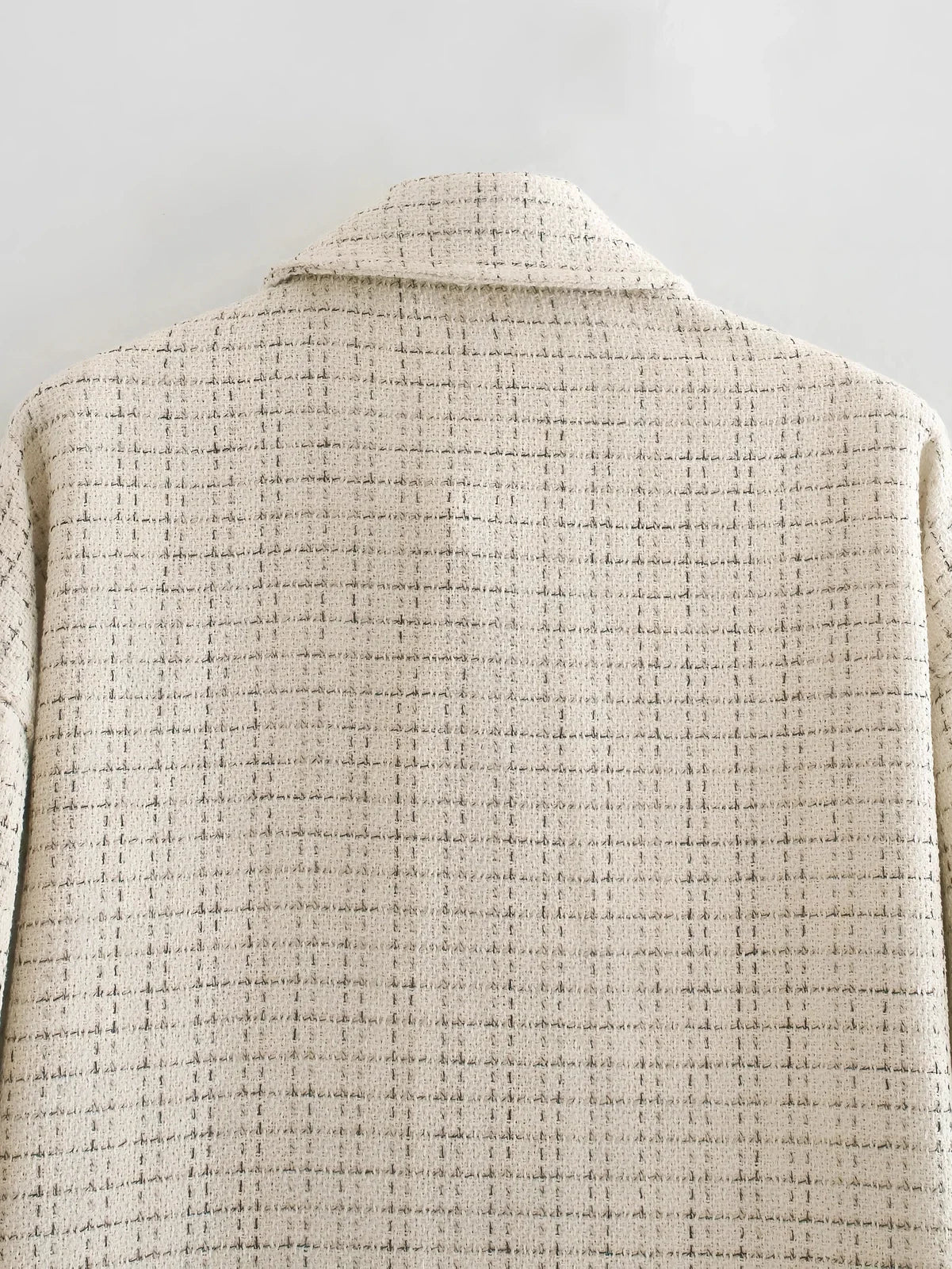 Women's beige plaid thick coat with pearl buttons, long sleeves, lapel collar, and side pockets in size M