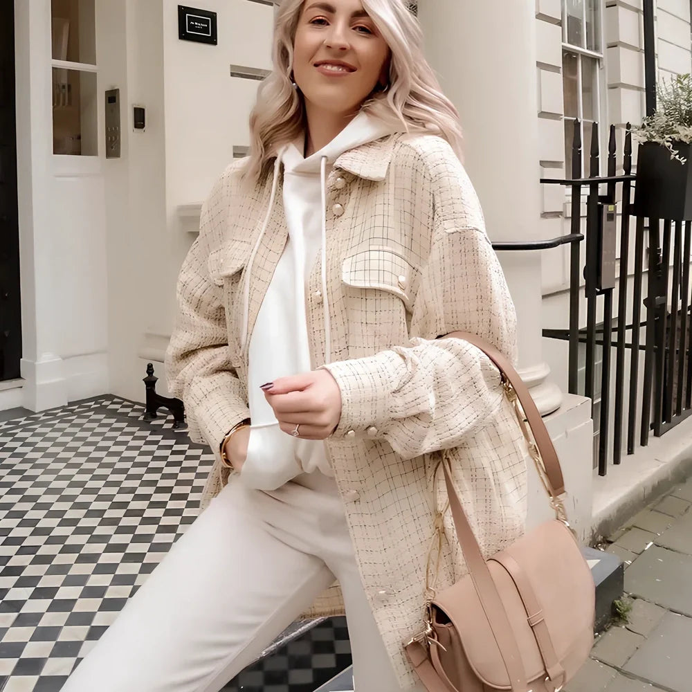 Women's beige plaid thick coat with pearl buttons, long sleeves, lapel collar, and side pockets in size M