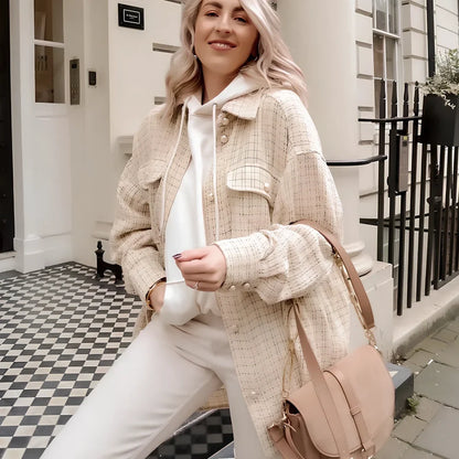 Women's beige plaid thick coat with pearl buttons, long sleeves, lapel collar, and side pockets in size M