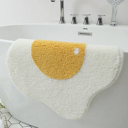 Stylish egg-shaped entrance mat made of premium polyester fabric with non-slip rubber backing, available in various sizes and colors to suit any Kiwi home's decor