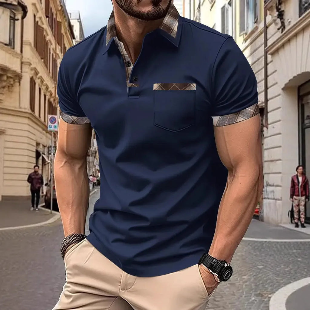 Man wearing a loose fit short sleeve t-shirt with a red and black plaid colourblock design.