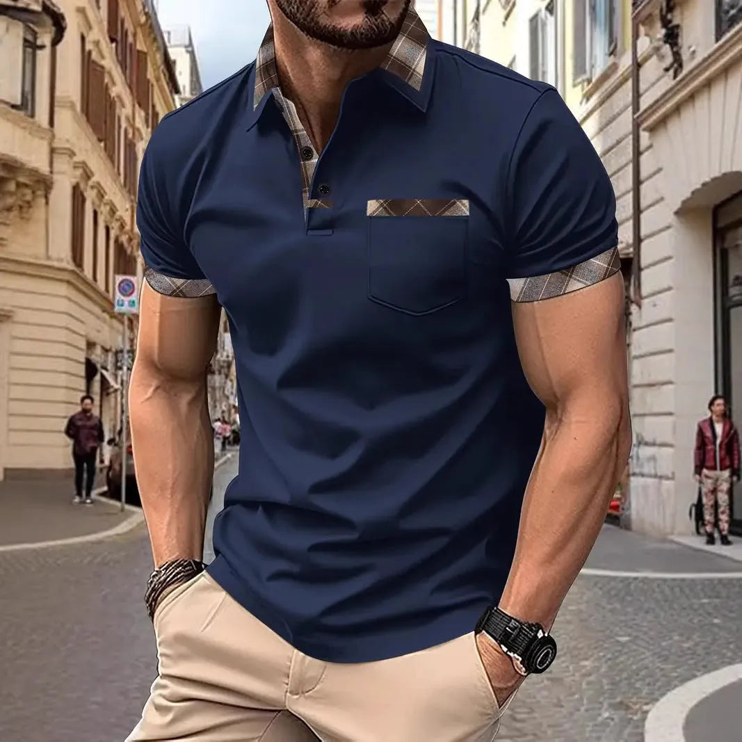 Man wearing a loose fit short sleeve t-shirt with a red and black plaid colourblock design.