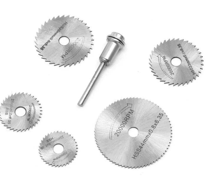 Six circular saw blades with mandrel in various sizes from 10mm to 25mm diameter