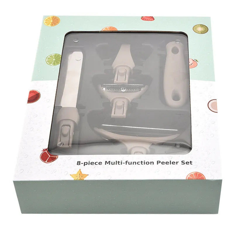 Green multi-function kitchen tool set with stainless steel blades for peeling, cutting and shaving on wheat straw chopping board
