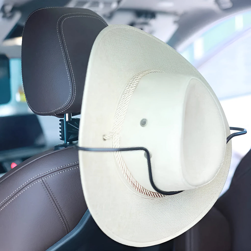 Black metal snap-on hat bracket mounted on a car rearview mirror