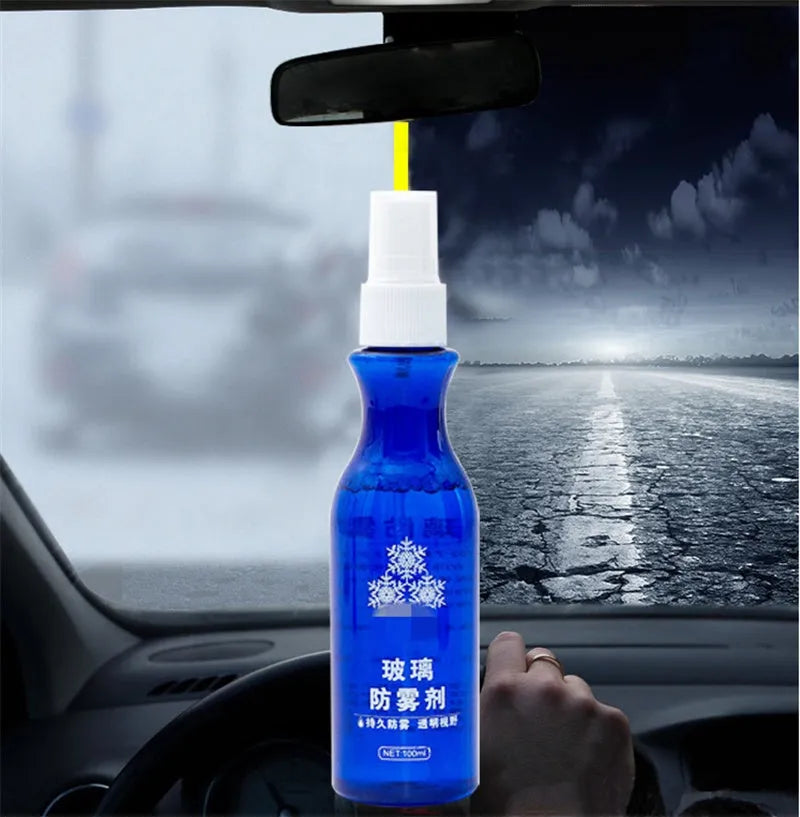Blue bottle of windscreen liquid-spray anti-fog agent 100 ml on car dashboard