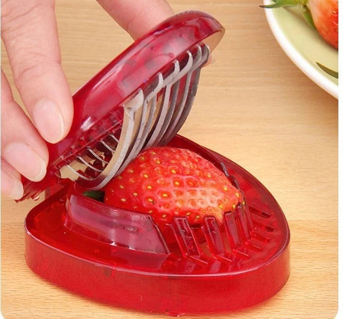 Red strawberry slicer with stainless steel blades for efficient and uniform fruit slicing