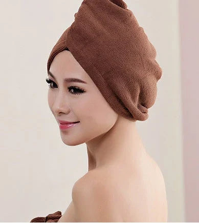 Absorbent microfiber hair turban in various vibrant colours, designed for fast and convenient drying