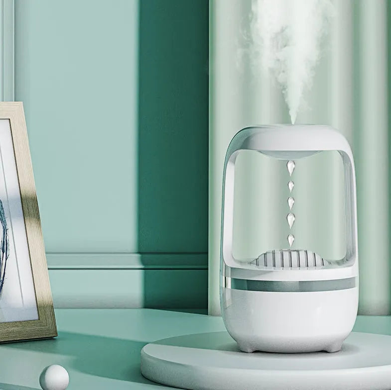 Anti gravity humidifier water drop backflow with 500ml white ABS body and black base on a desk