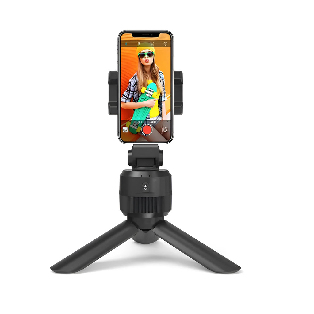 Black 360 degree rotating mobile phone holder on a desk, ABS construction with full rotation capability