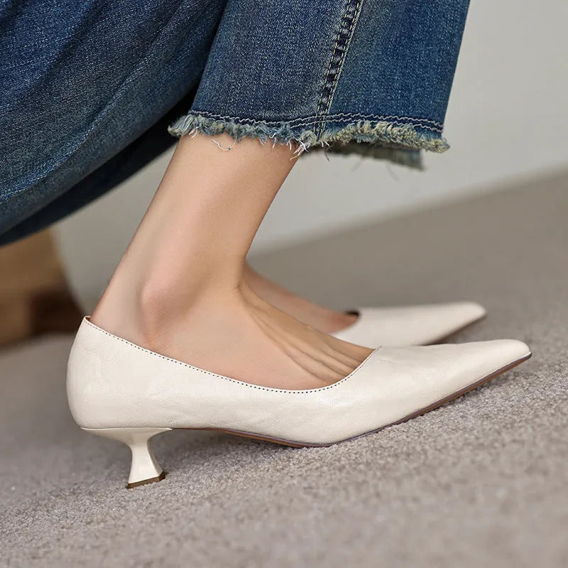 Women's solid colour French pointed-toe mid heel cowhide pumps in black with stiletto heel
