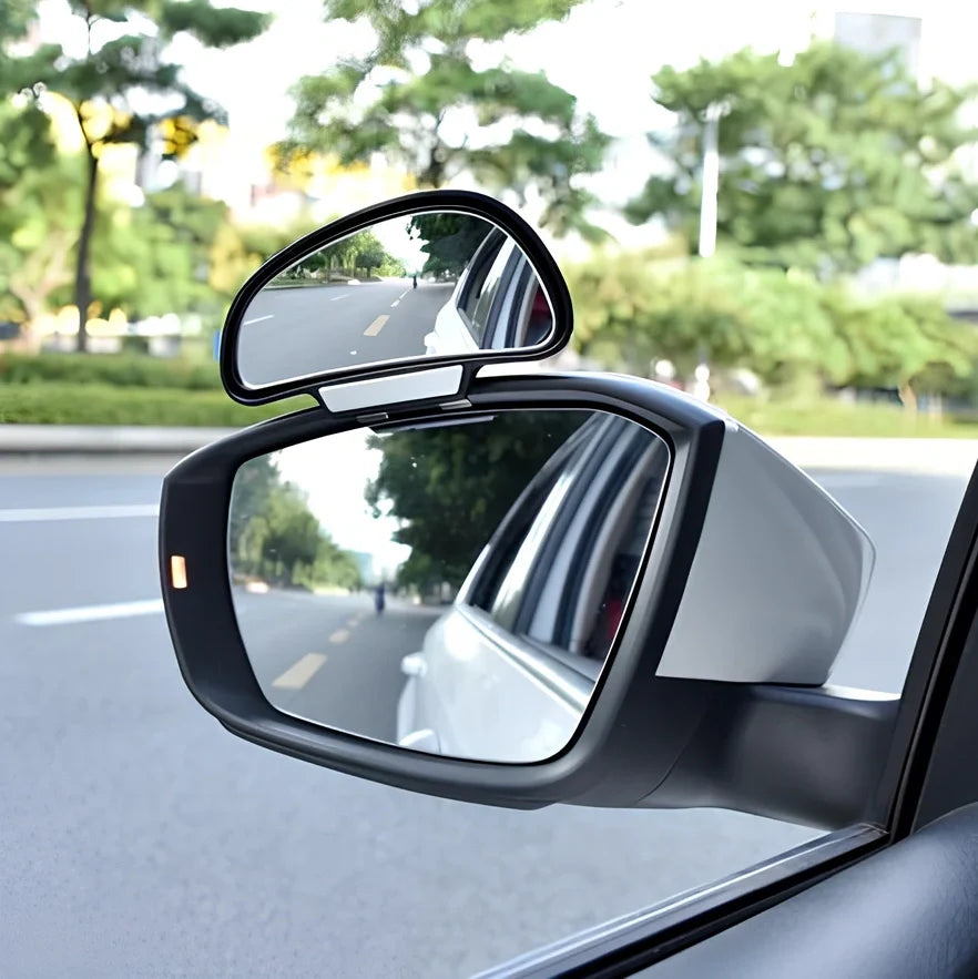 Black adjustable car blind spot mirror with 360-degree lens and 3M adhesive on rearview mount