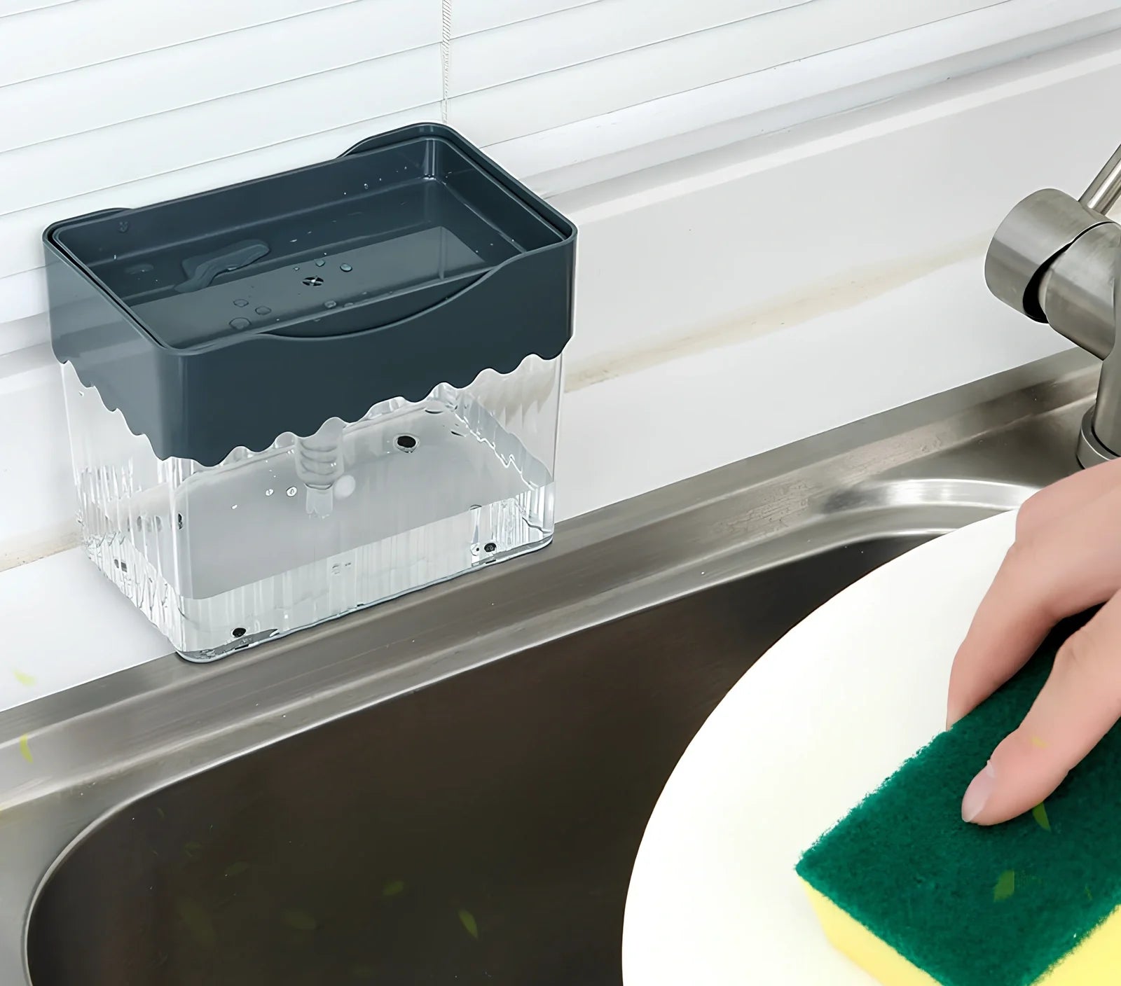 Dark blue 2-in-1 soap dispenser and sponge caddy unit on kitchen counter with measuring tape showing 13.5cm diameter