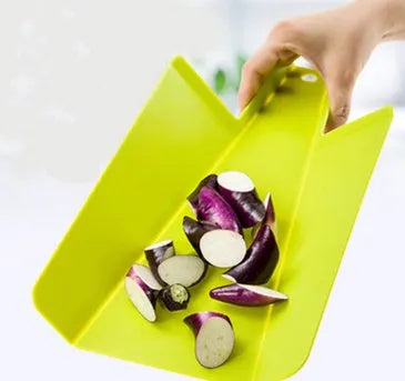 Green folding plastic cutting board 37.5cm x 21cm with non-slip texture and hanging hole on a kitchen counter