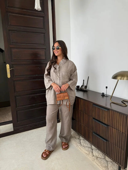 Stylish women's two-piece outfit featuring wide-leg pants and long-sleeve top in a variety of chic colors