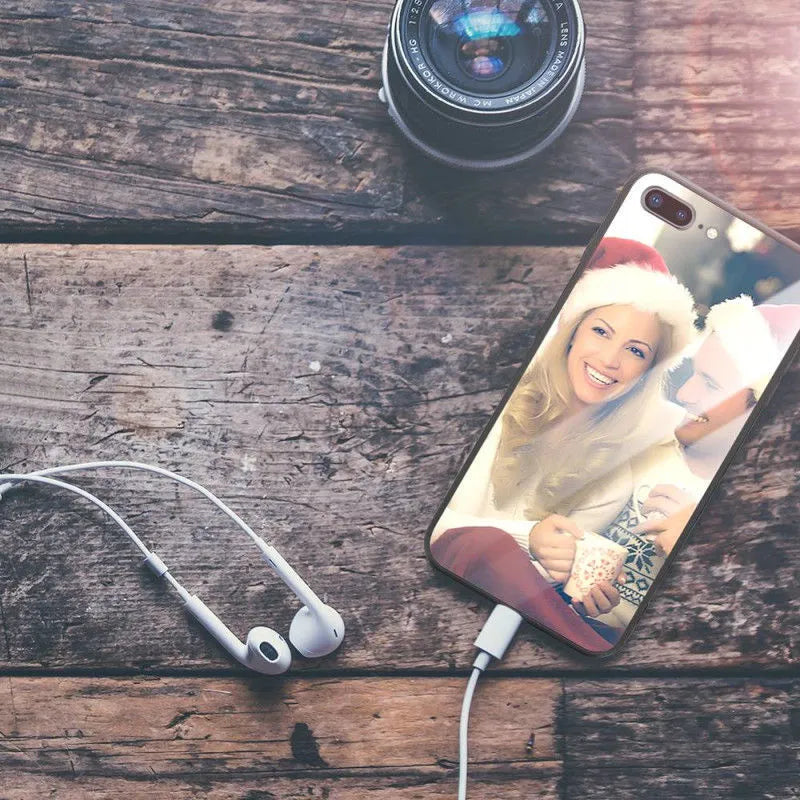Custom patterned ultra-thin iPhone case with raised bumper edge, shown fitted on an iPhone.