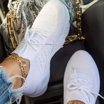 Comfortable and stylish women's platform sneakers with mesh upper and rubber outsole, available in multiple colors and sizes