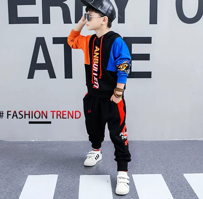 Boys' Korean-style two-piece spring suit in gules red or yellow, 95% cotton with long sleeves and fixed hood, sizes 110-180 yards for 100-170cm heights