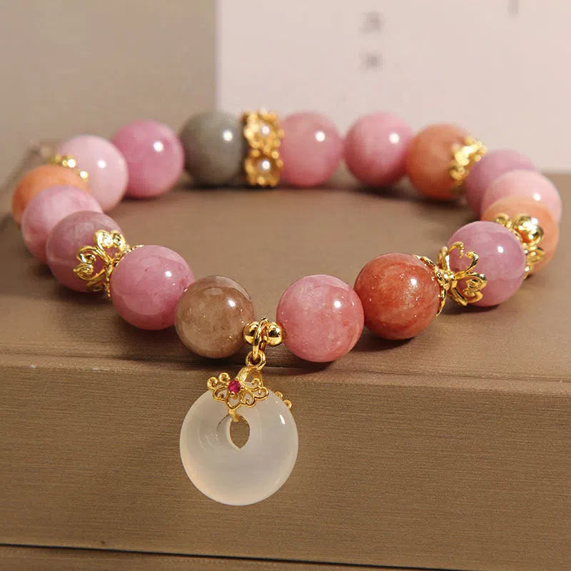 Macaron tourmaline peace buckle pendant bracelet on neutral background, women's retro style