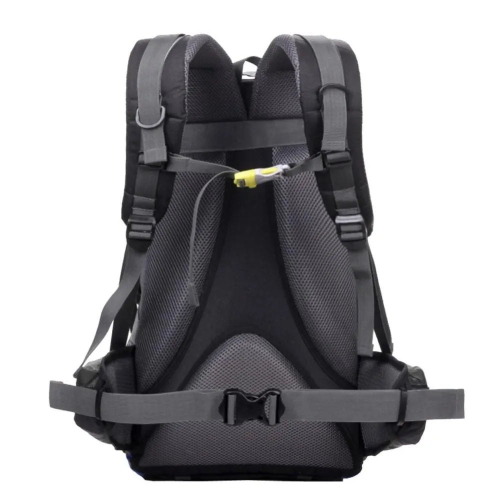 Green polyester outdoor sports backpack with 20-35 litre capacity for hiking and running.