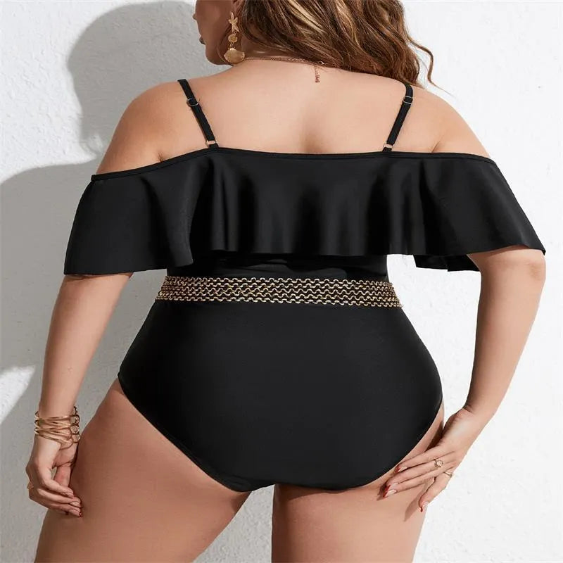 Black women's one-piece swimsuit on hanger, plus size range 0XL to 4XL.