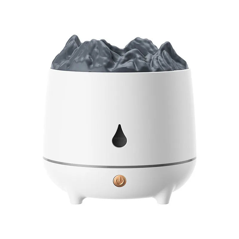 Black or white volcano-shaped USB humidifier on a table, emitting mist.