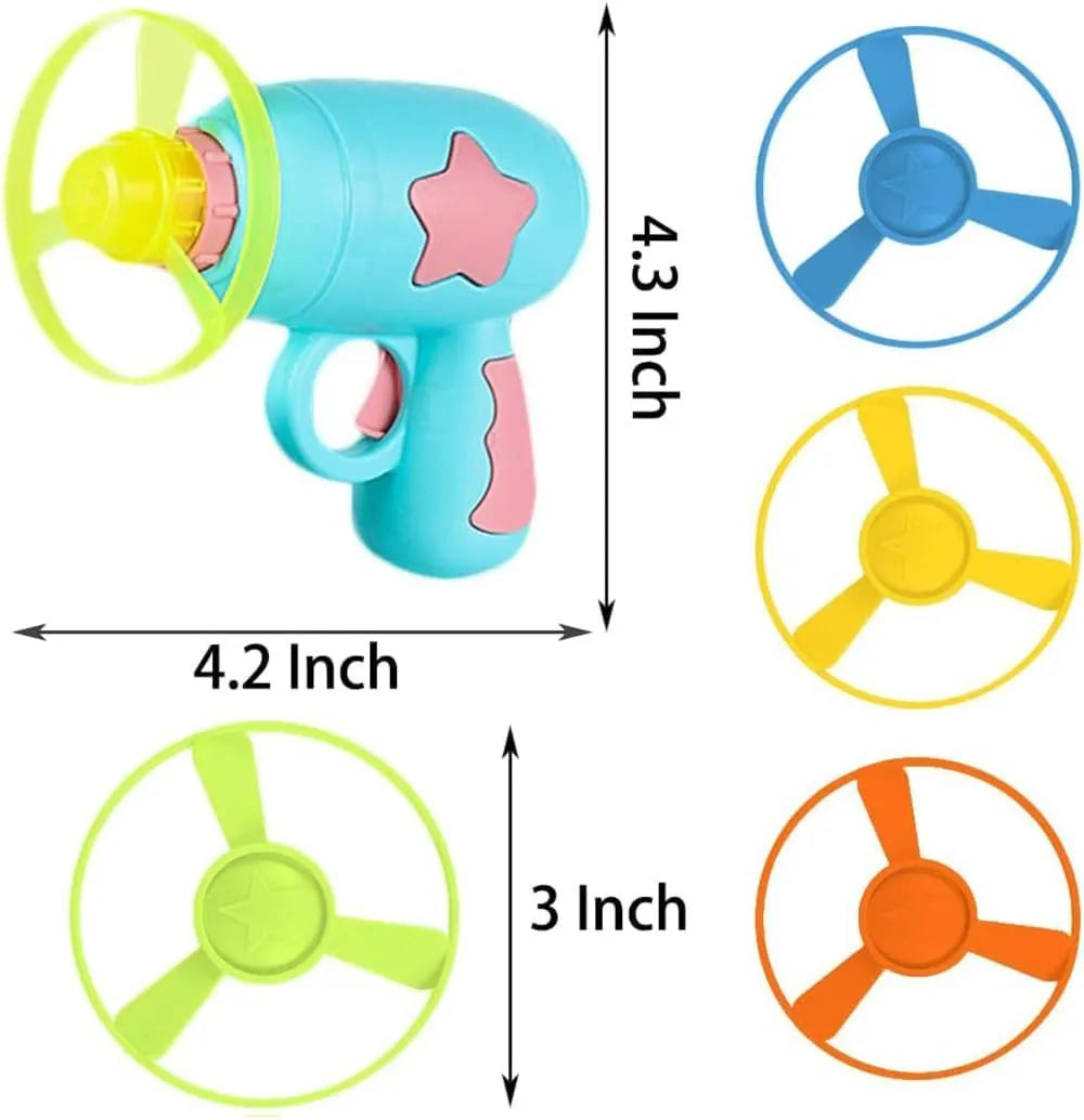Blue interactive cat toy gun with a plastic frisbee on the launch head, shown next to a second pink frisbee.
