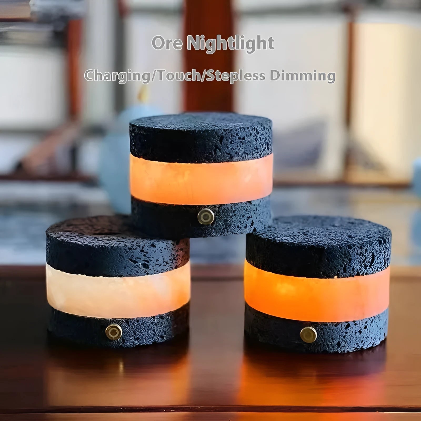 Small orange volcanic rock USB night lamp with warm light, shown next to a USB cable