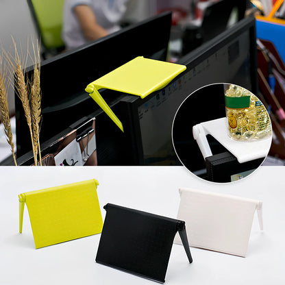 White ABS computer screen organiser rack with adjustable stands on office desk