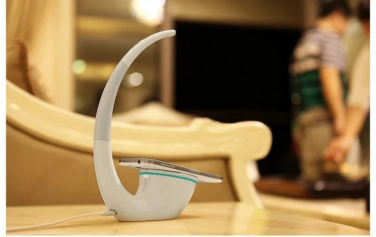 Wireless Qi charging lamp with sleek radian design, touch controls, and LED lighting