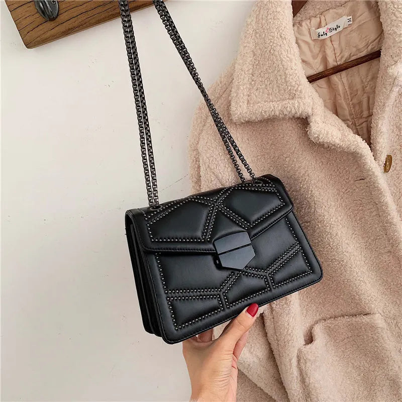 Small square shoulder bag with studs, chain handle, black colour, flat lay view