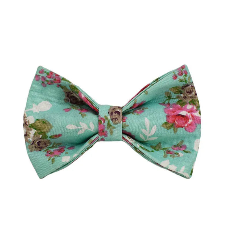 Rose pattern dog collar set with green background including collar, leash, and detachable bow