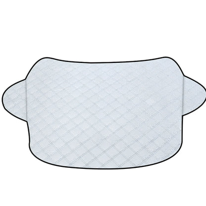 Silver magnetic windshield cover showing aluminium foil coating and edge magnets for vehicle protection