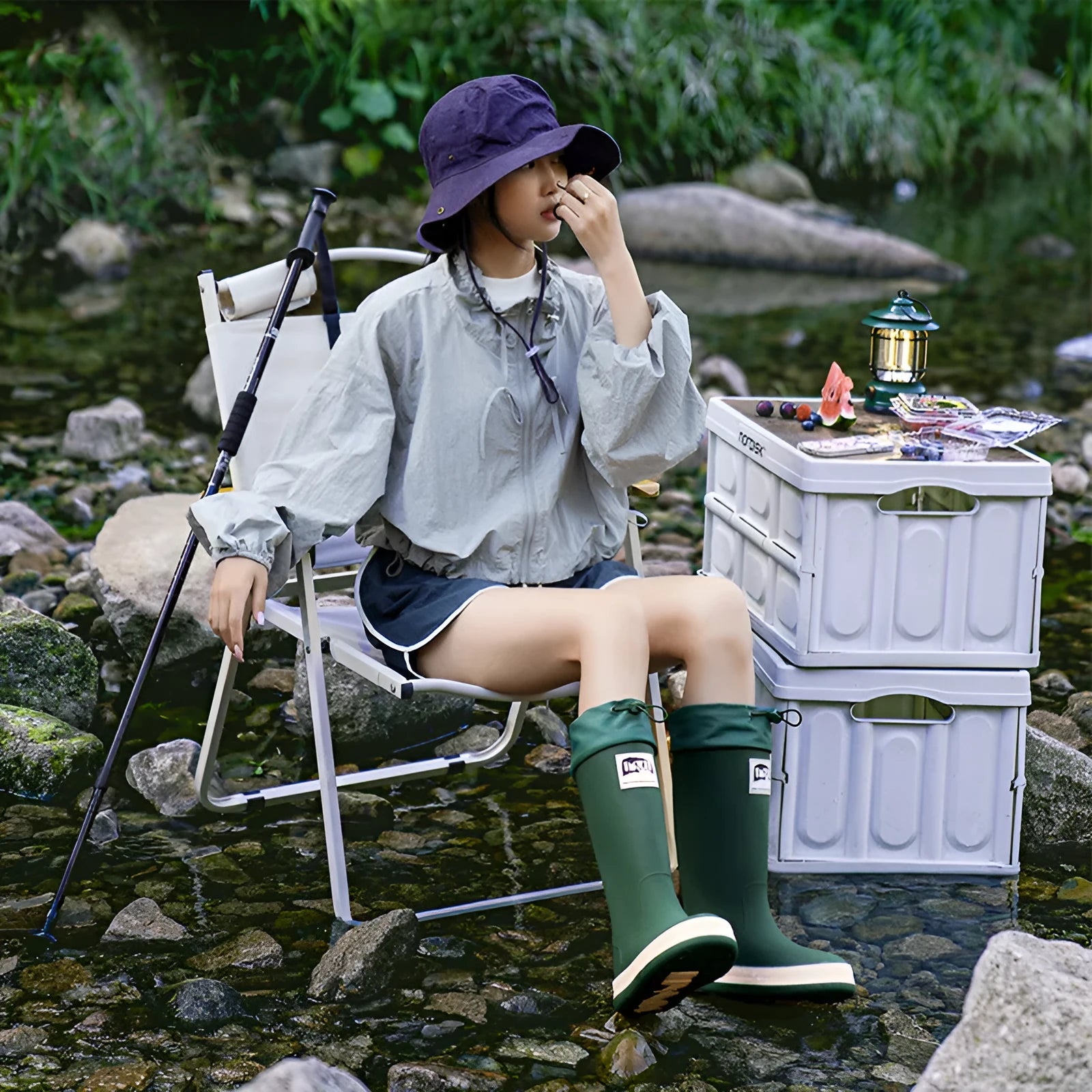 Pair of solid-colour high-tube PVC rain boots with a non-slip sole on a neutral background.