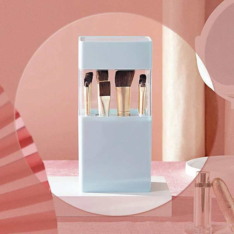 Inverted makeup brush storage bucket in white, blue, and pink for organised dressing tables