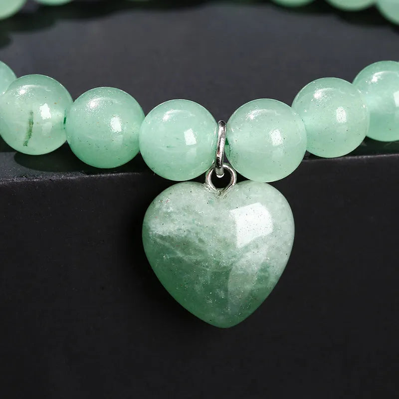 Natural stone love pendant bracelet for women with geometric heart, available in multiple stone types and 8mm or 10mm beads.