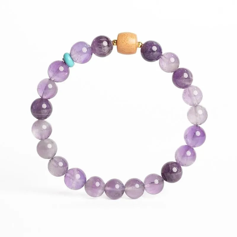 Purple natural amethyst crystal bracelet for women with round beads, shown in 6mm and 8mm size options.