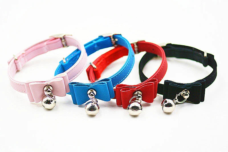 Stylish dog collar with bow tie and bell in various colors, perfect for New Zealand pet owners