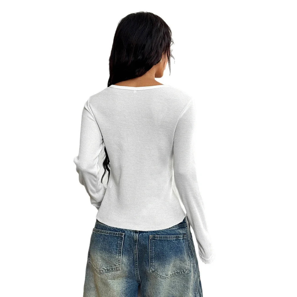 Women's slim fit long sleeve vest t-shirt with button front closure in polyester fabric
