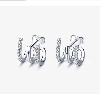 Three-layer sterling silver heart earrings with gem accents, handmade in Korean style