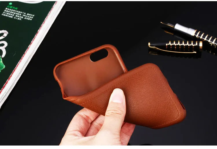Leather iPhone case with card slot in black, brown, navy blue and wine red colours