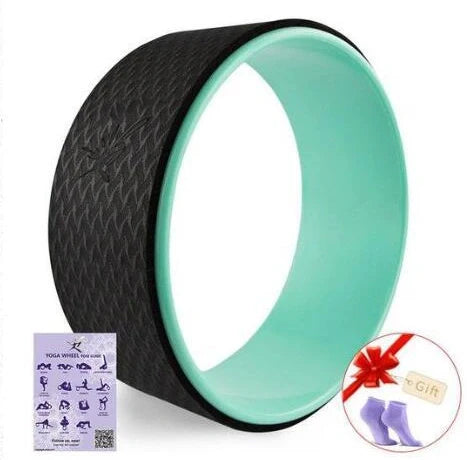 Green yoga wheel with 33cm diameter and 20mm thickness for spinal flexibility exercises