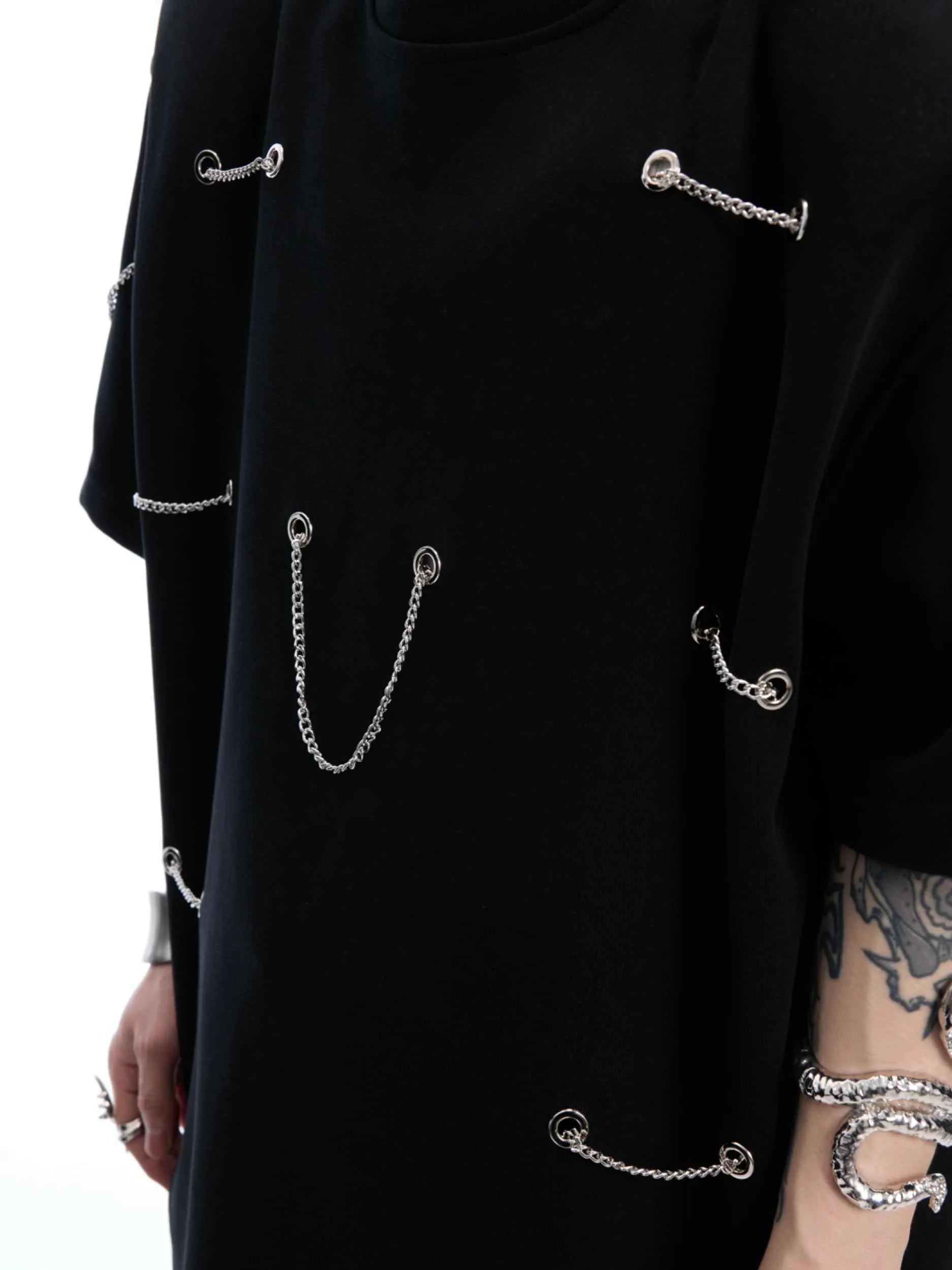Black heavy cotton t-shirt with padded chain shoulder detail on short sleeves