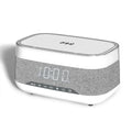 White multifunctional alarm clock with Bluetooth speaker and wireless charging pad for mobile phones
